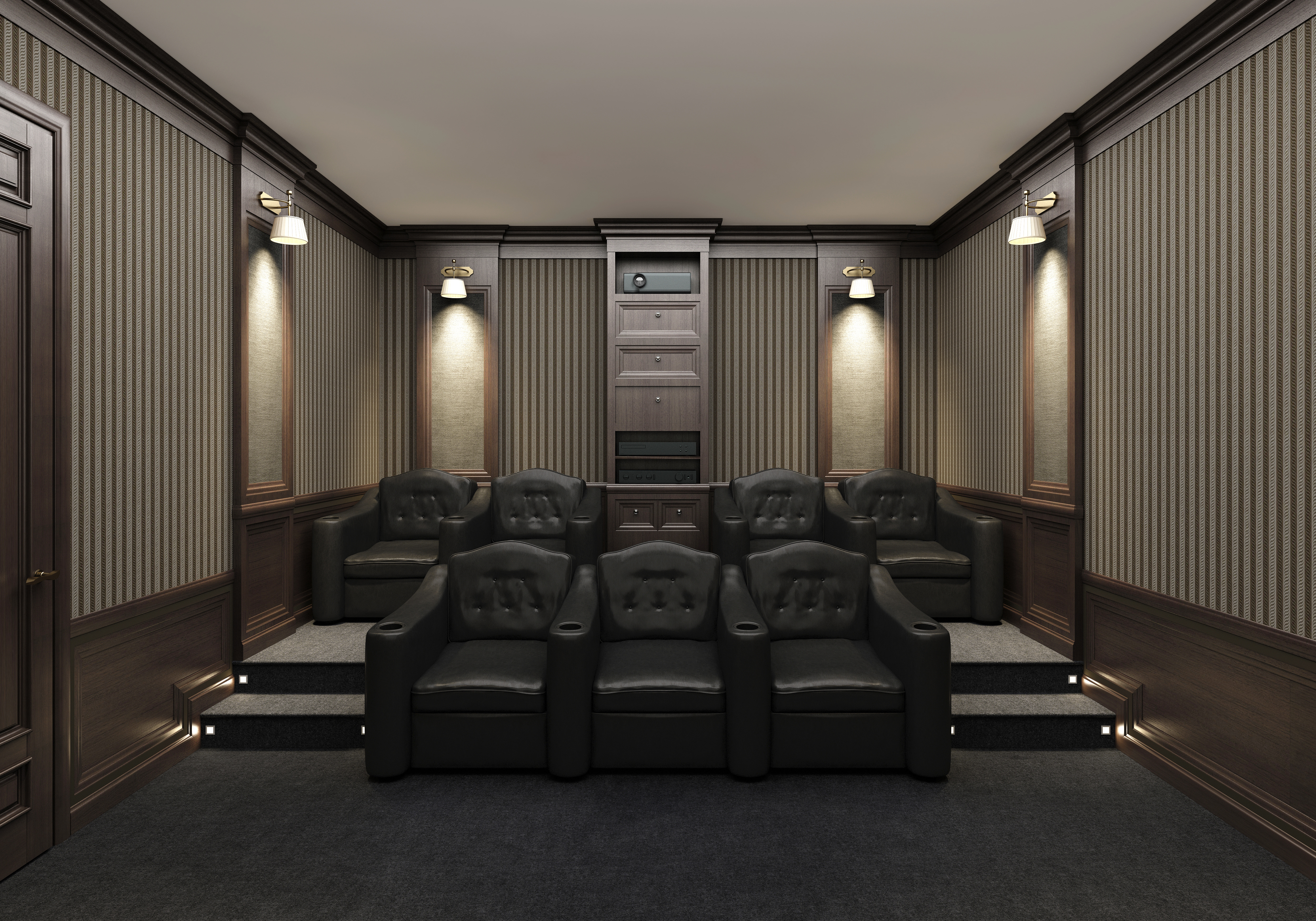 Home theater with large, comfy, black chairs, aisles, and decorative lighting